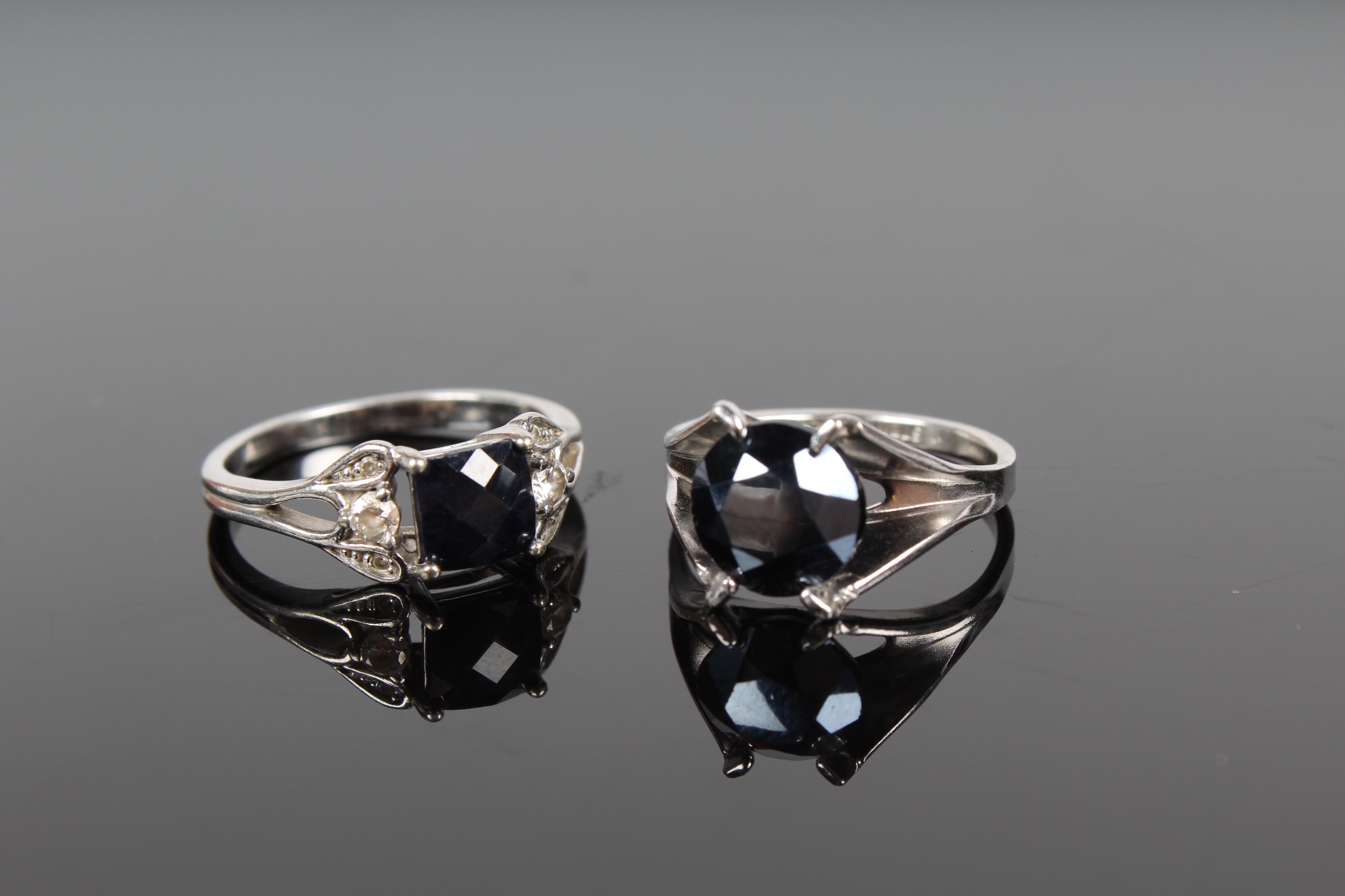 Pair of Sterling Silver, Hematite, Onyx and Cubic Zirconia Rings