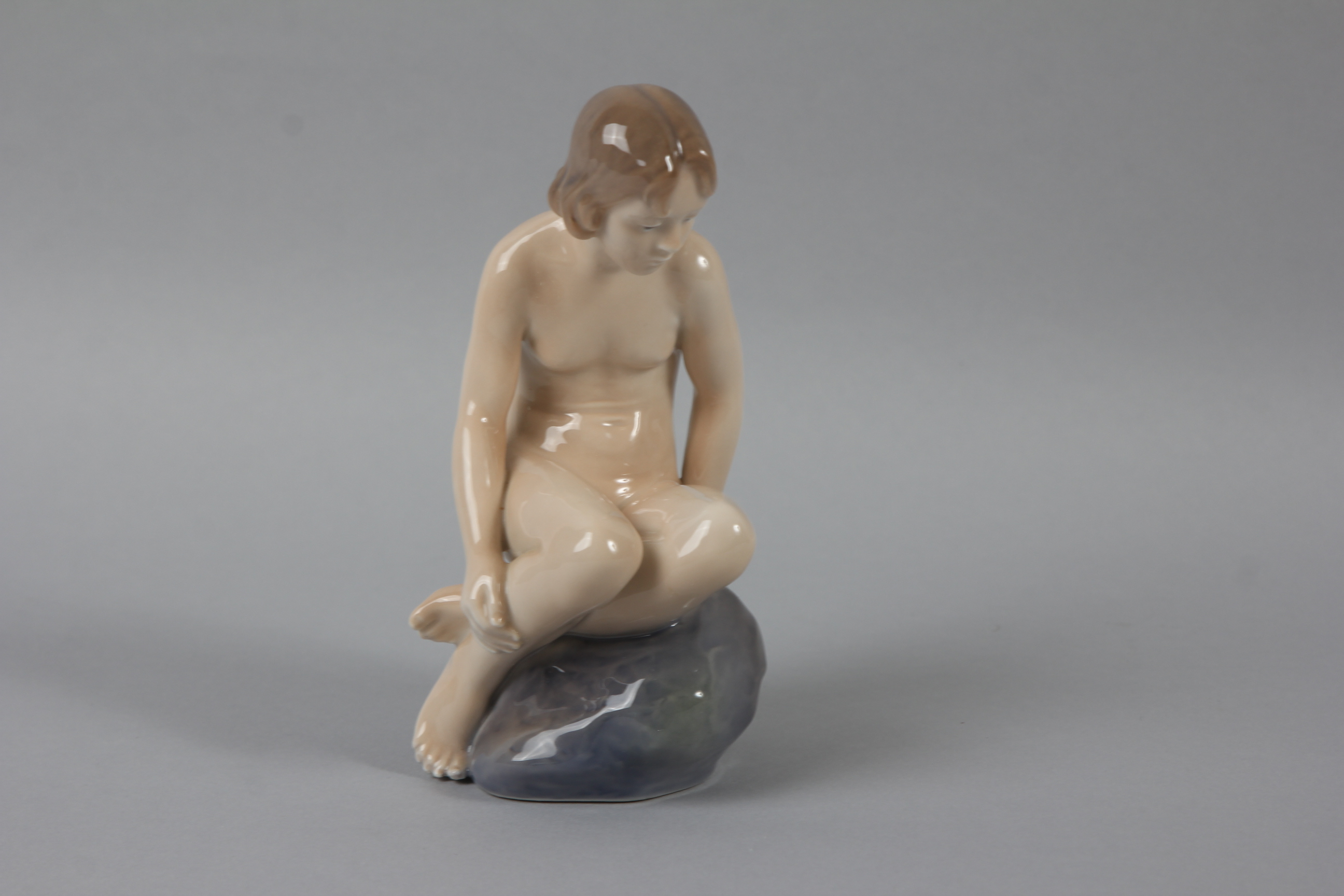 Royal Copenhagen "Nude Girl on a Rock" Figurine