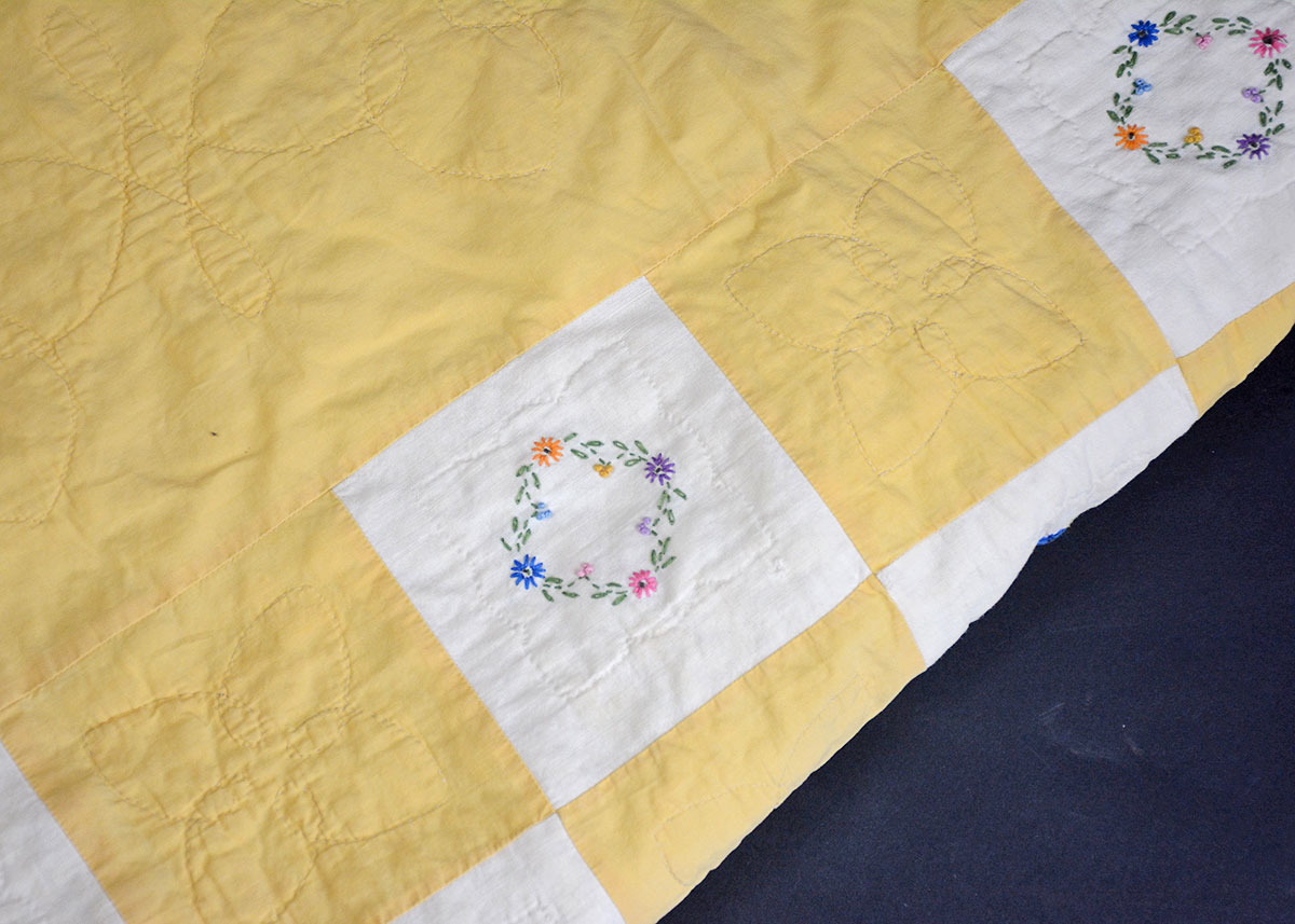 Vintage Handmade Yellow and White Embroidered Quilt