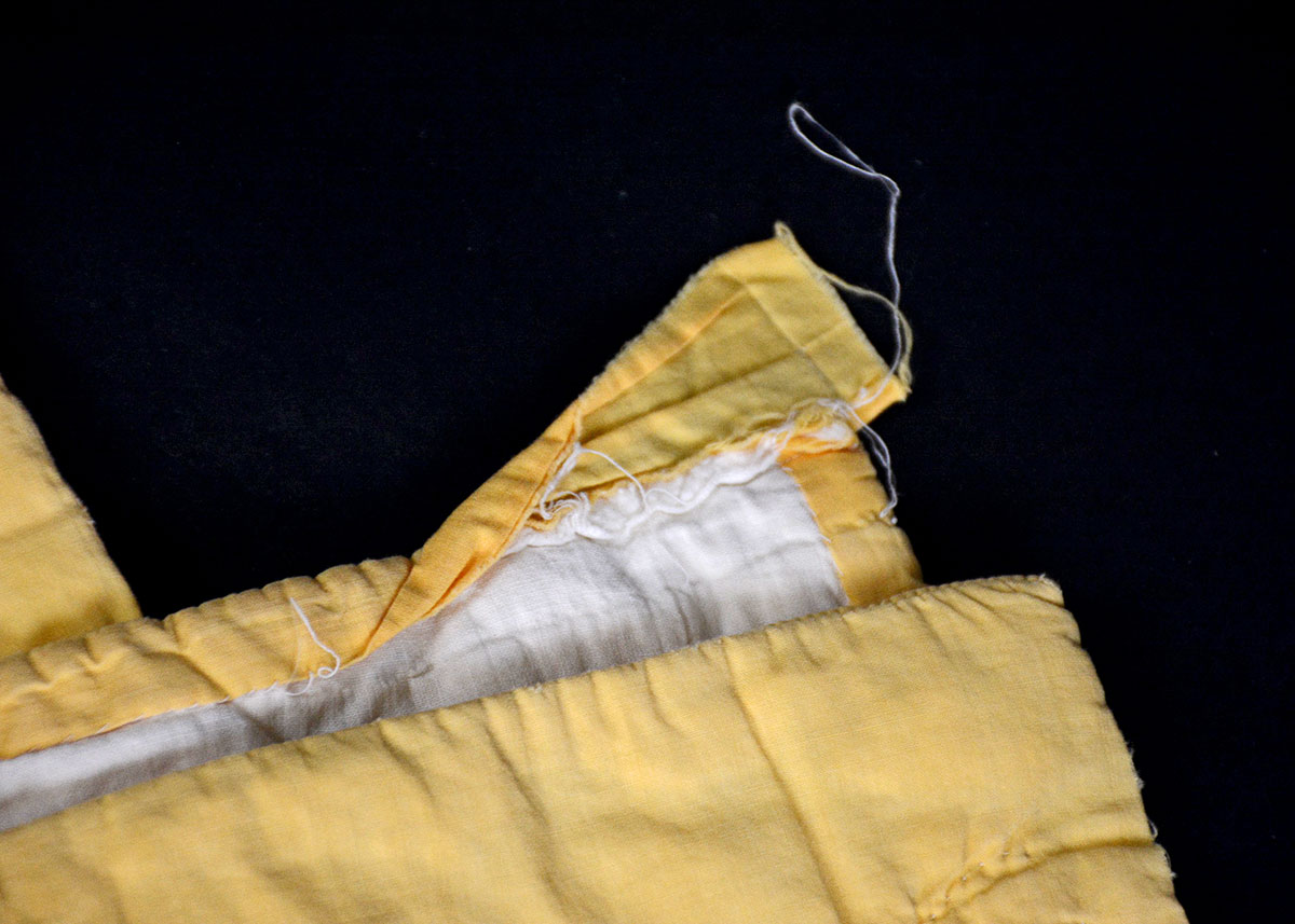 Vintage Handmade Yellow and White Embroidered Quilt