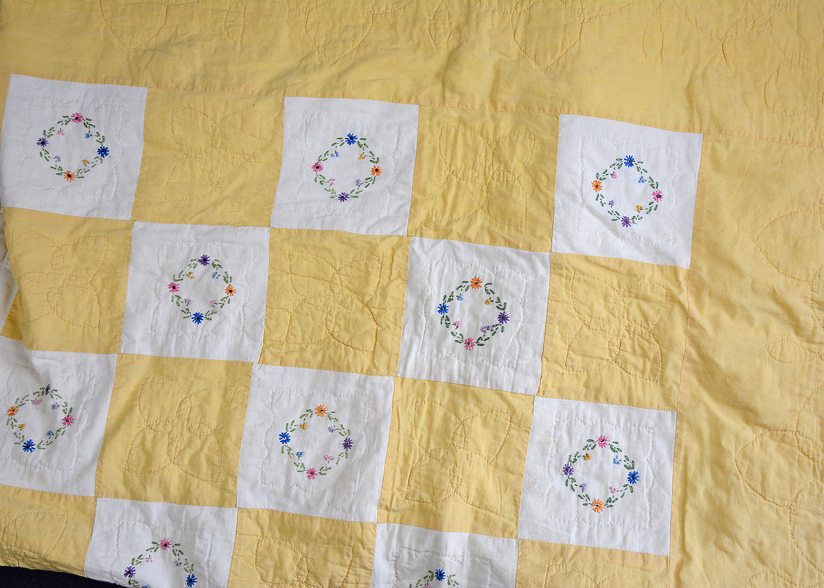 Vintage Handmade Yellow and White Embroidered Quilt