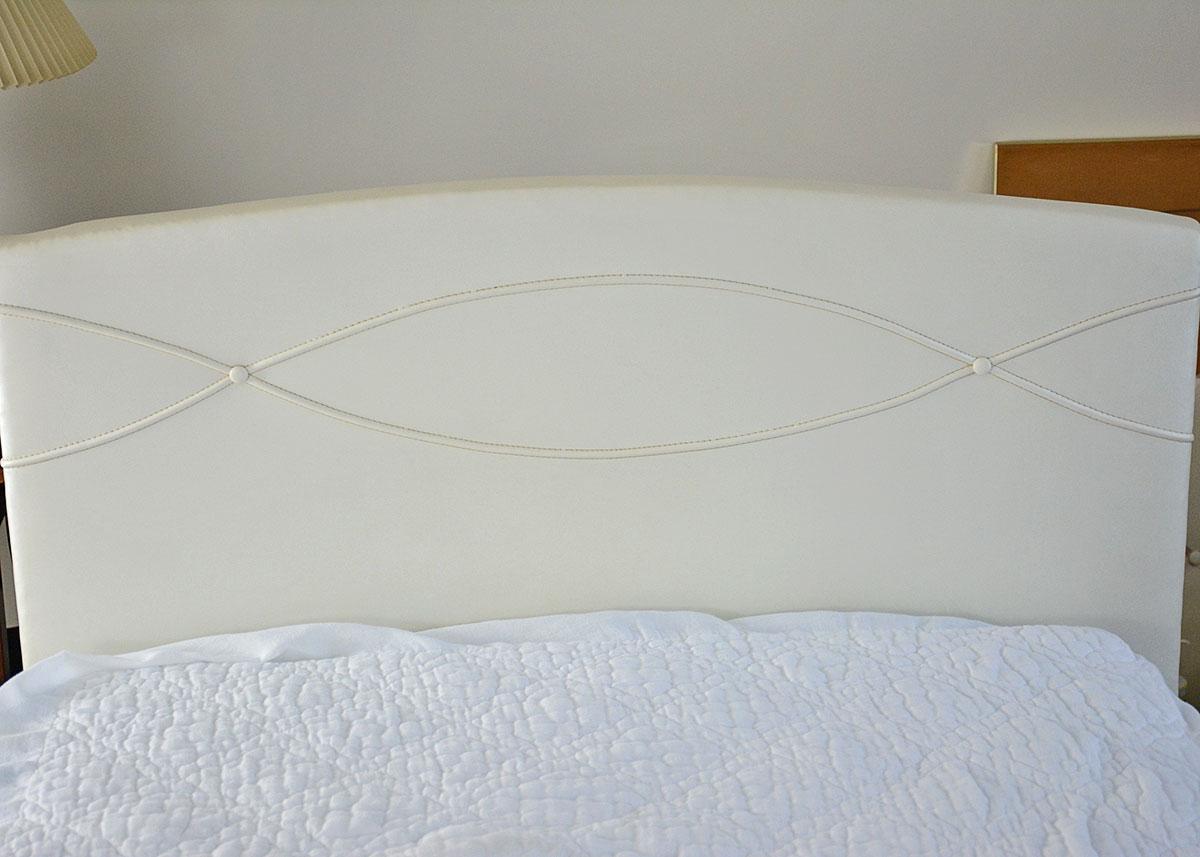 Twin Bed with Pearl White Leatherette Headboard