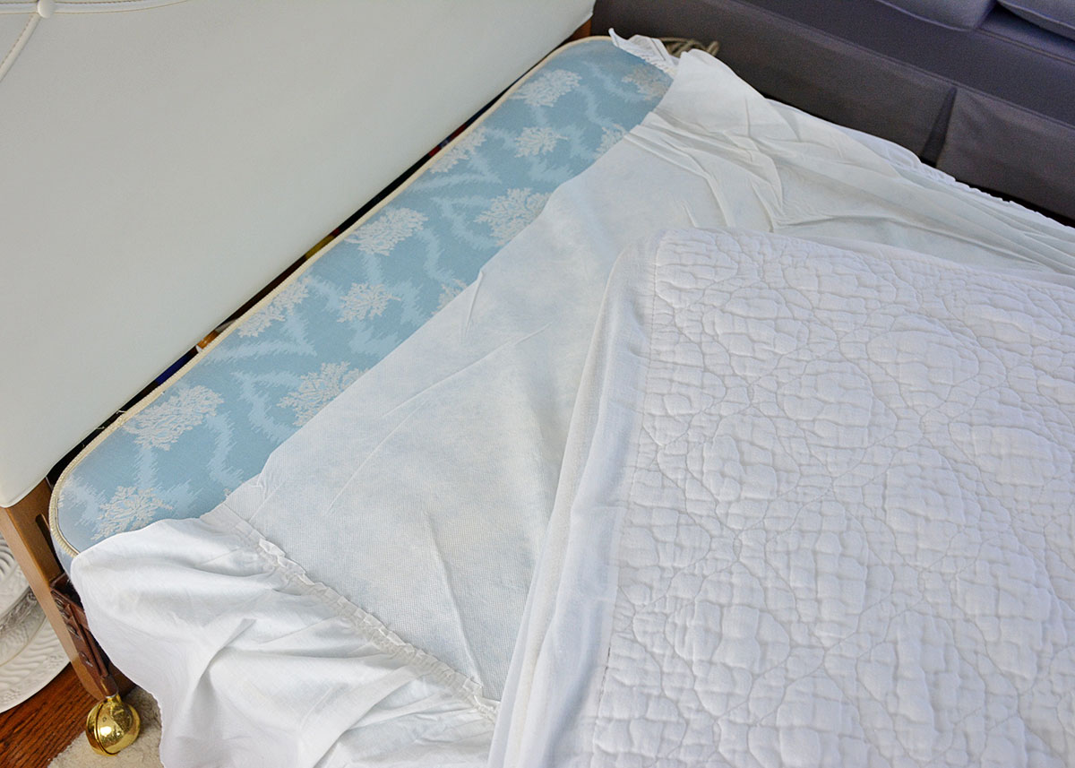 Twin Bed with Pearl White Leatherette Headboard