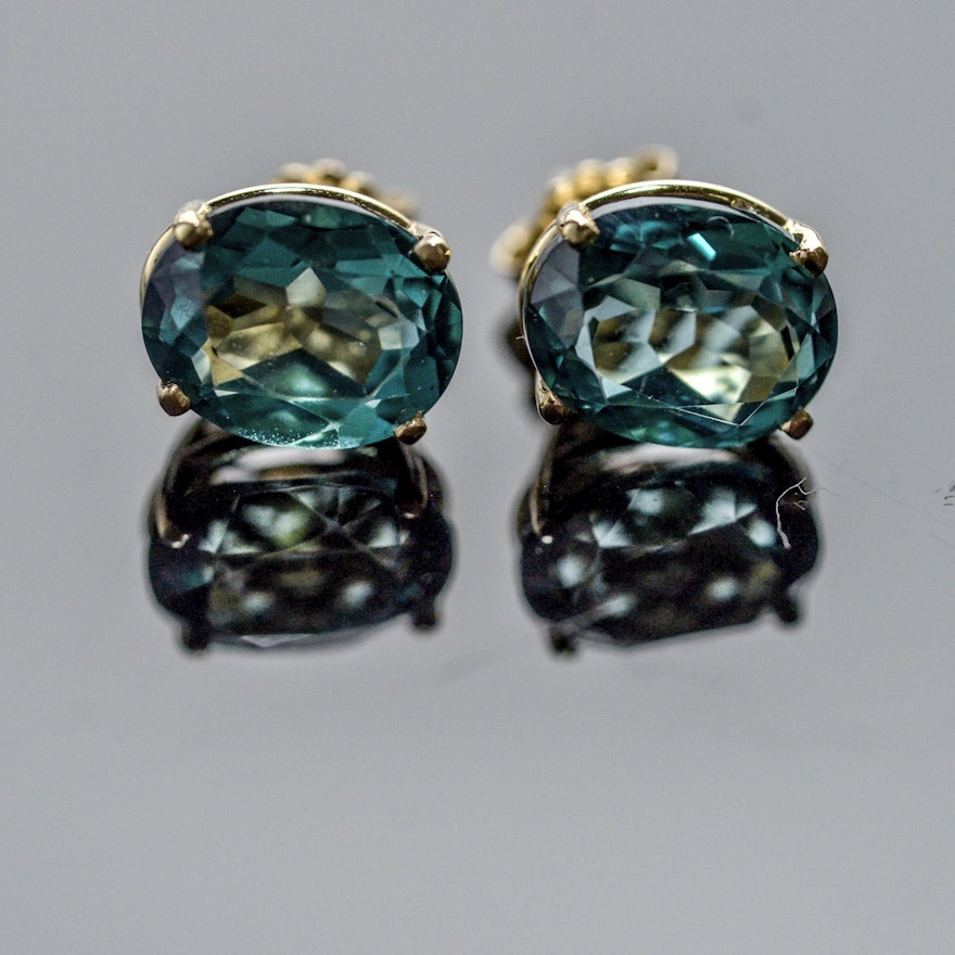 Oval green-blue topaz and 14k stud earrings