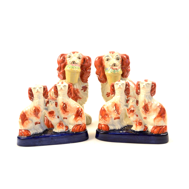 Four Antique and Reproduction Staffordshire Dog Figurines