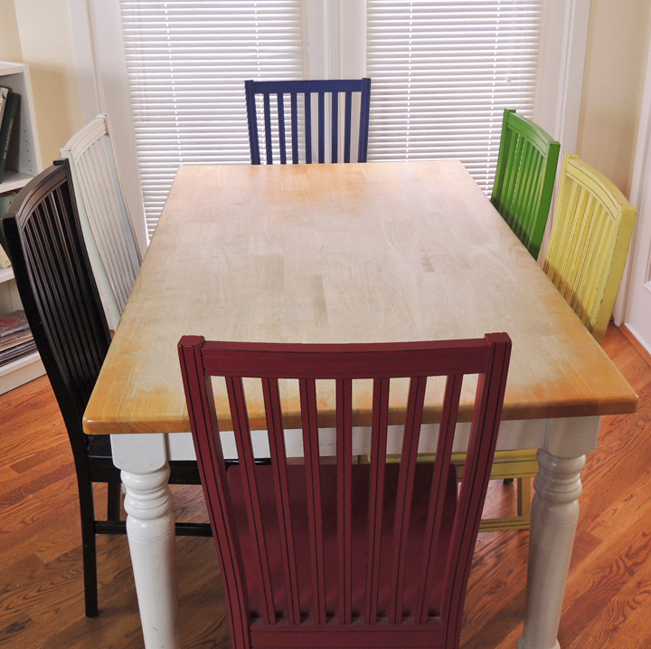 Farmhouse Kitchen Table and Six Multi-Colored Chairs