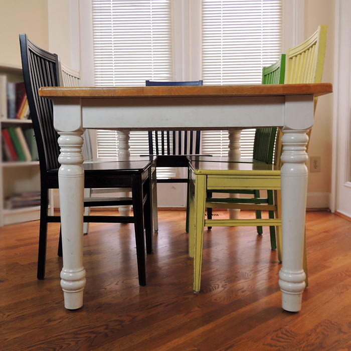 Farmhouse Kitchen Table and Six Multi-Colored Chairs