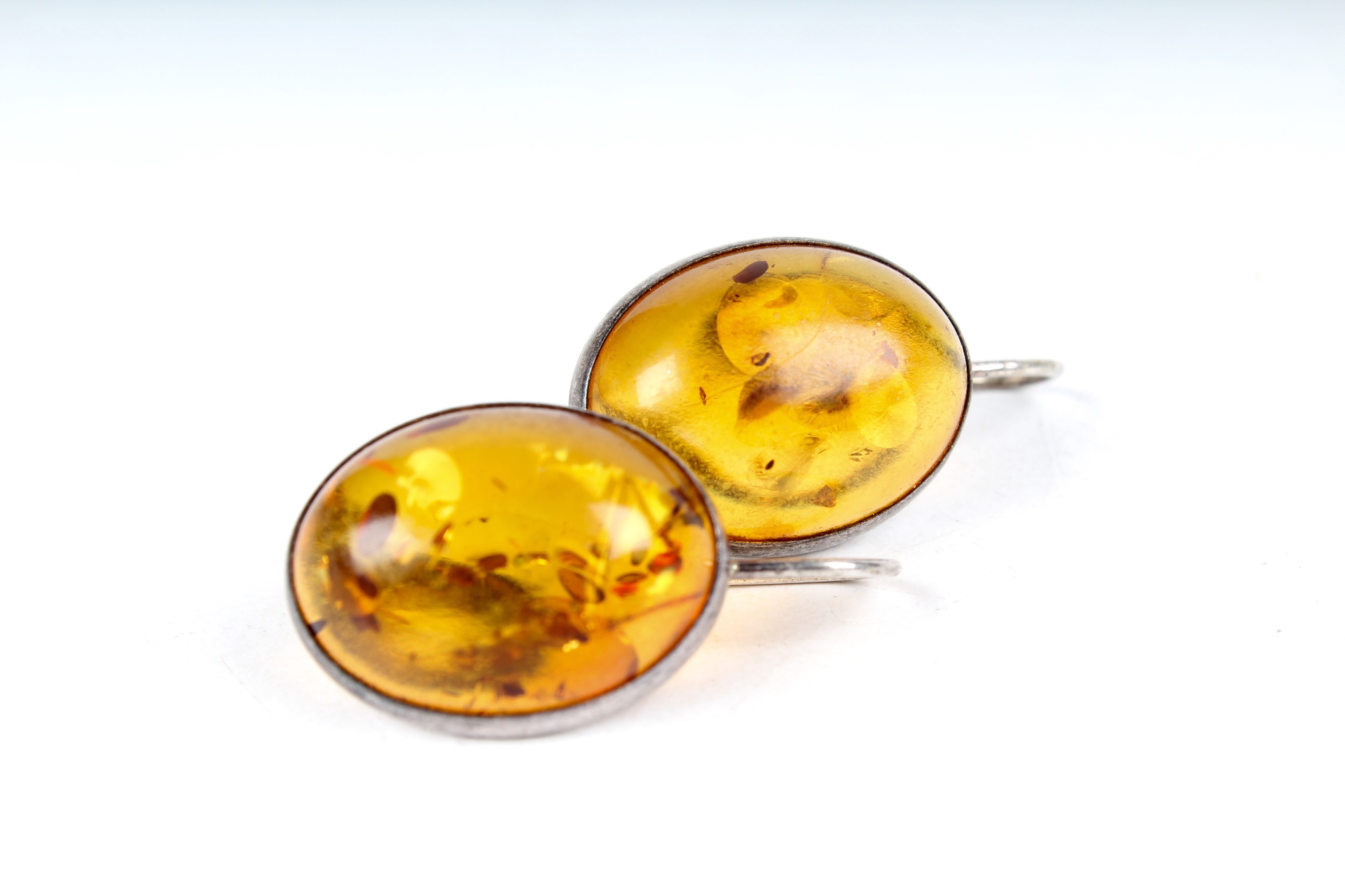 Pair of Sterling Silver and Amber Earrings