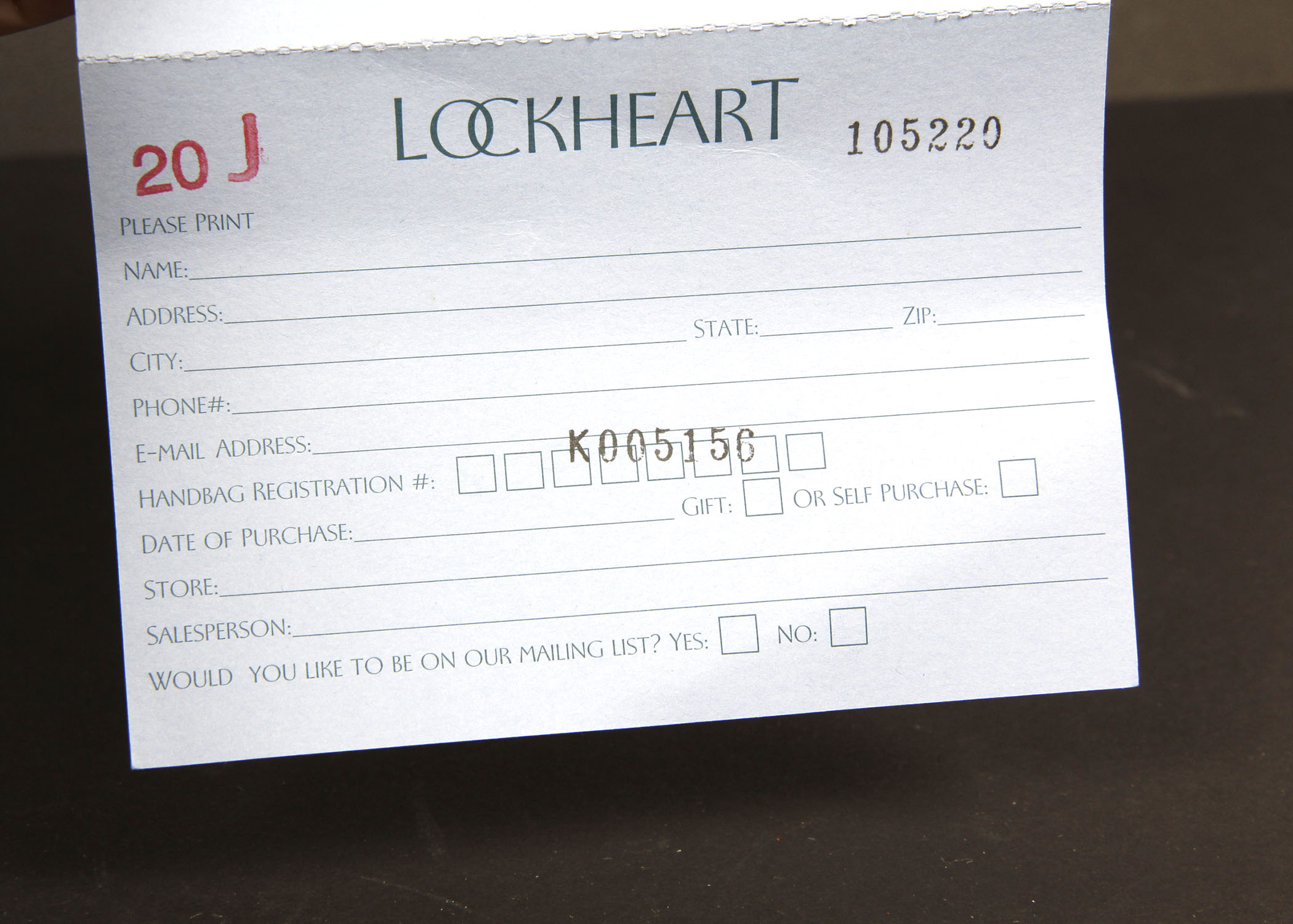 Lockheart White Leather Handbag