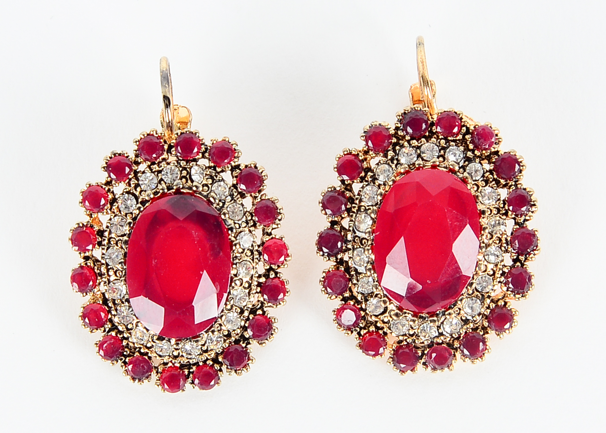 Two Pairs of Ruby, Rhinestone, and Chrysoprase Earrings