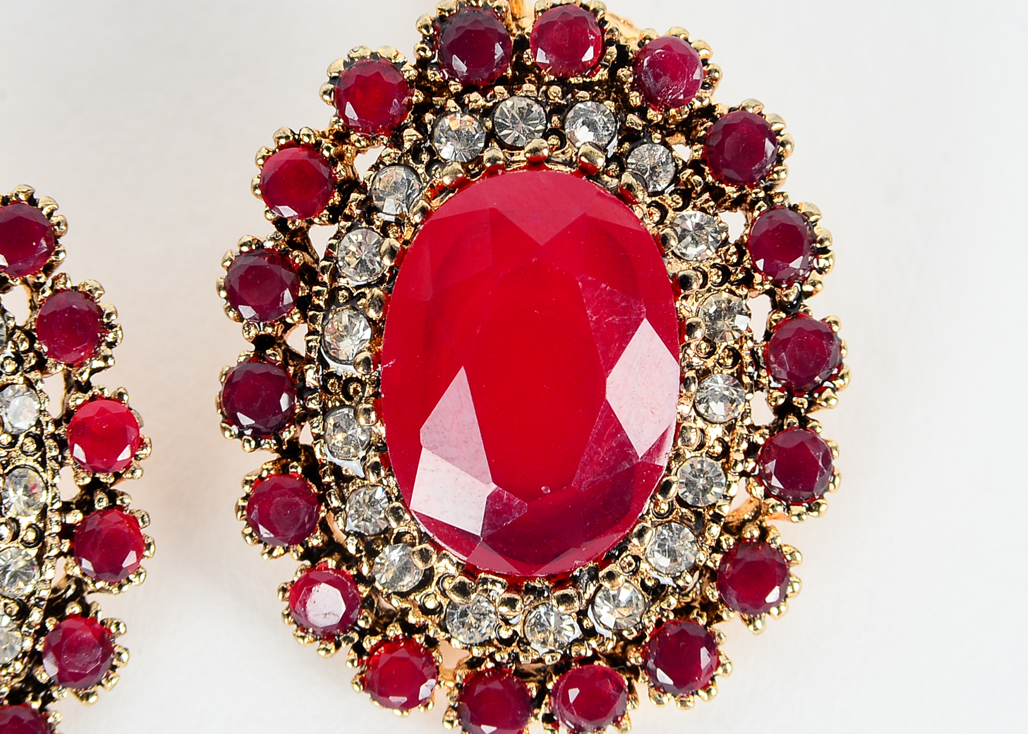 Two Pairs of Ruby, Rhinestone, and Chrysoprase Earrings