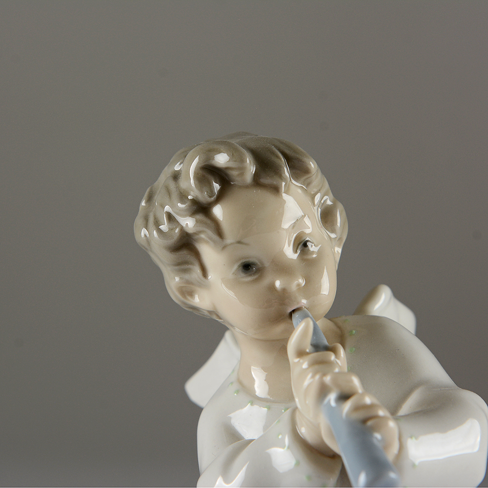 Lladro Angel With Flute Porcelain Figure
