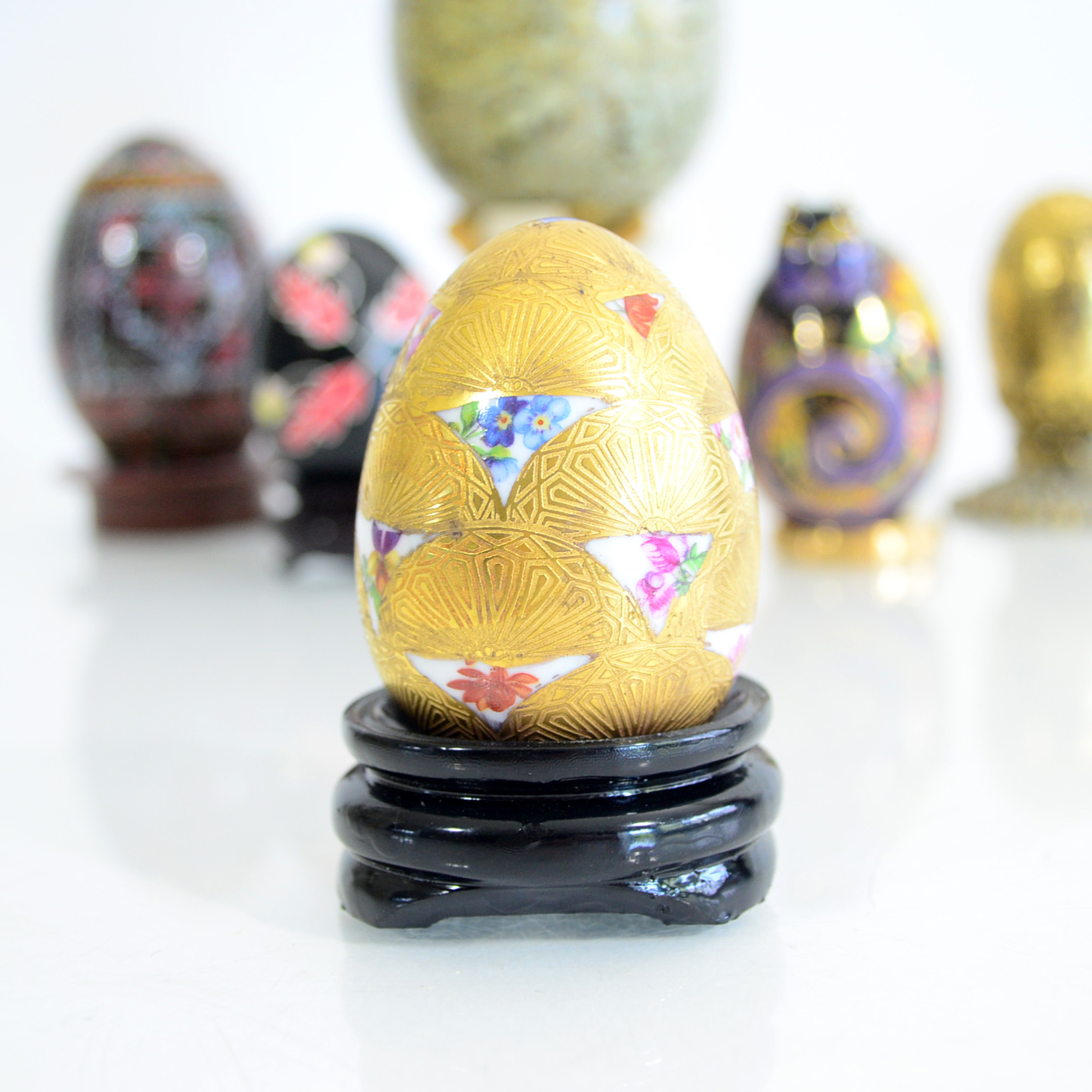 Assortment Of Decorative Eggs and Stands