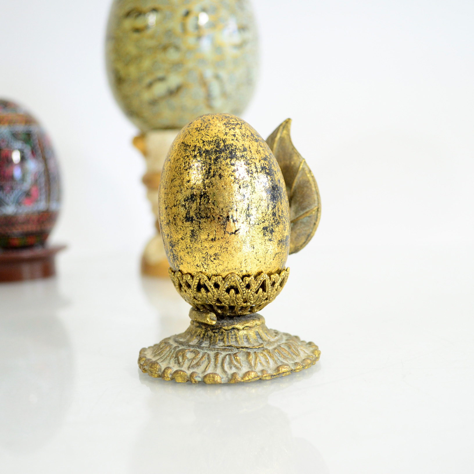 Assortment Of Decorative Eggs and Stands