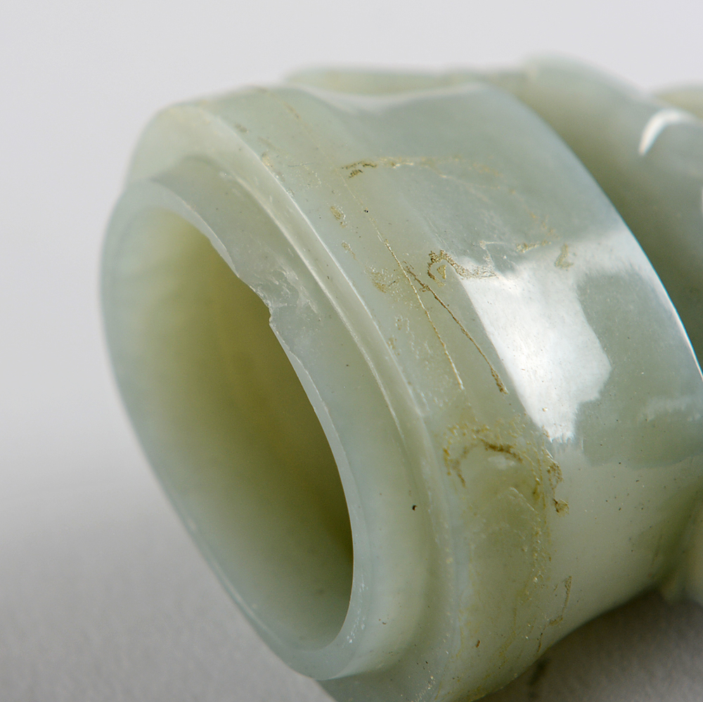 Carved Green Stone Figure and Urn