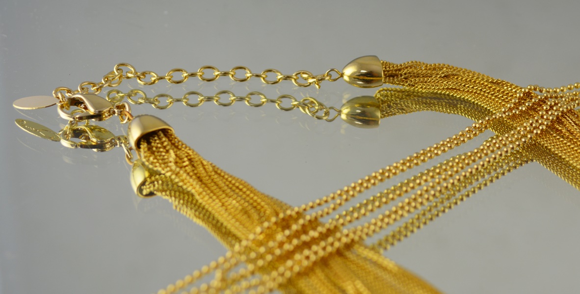 Two Gold Tone Multi-Strand Necklaces and Scarf Ring