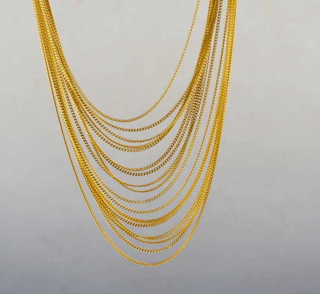 Two Gold Tone Multi-Strand Necklaces and Scarf Ring