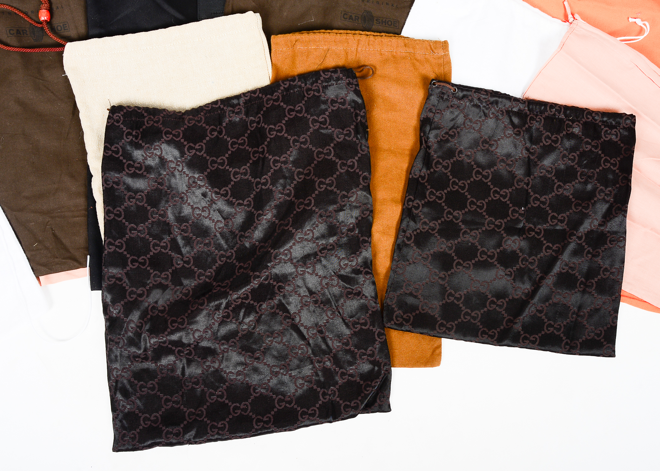 Collection of Dust Bags Featuring Prada, Chanel, Gucci, and More