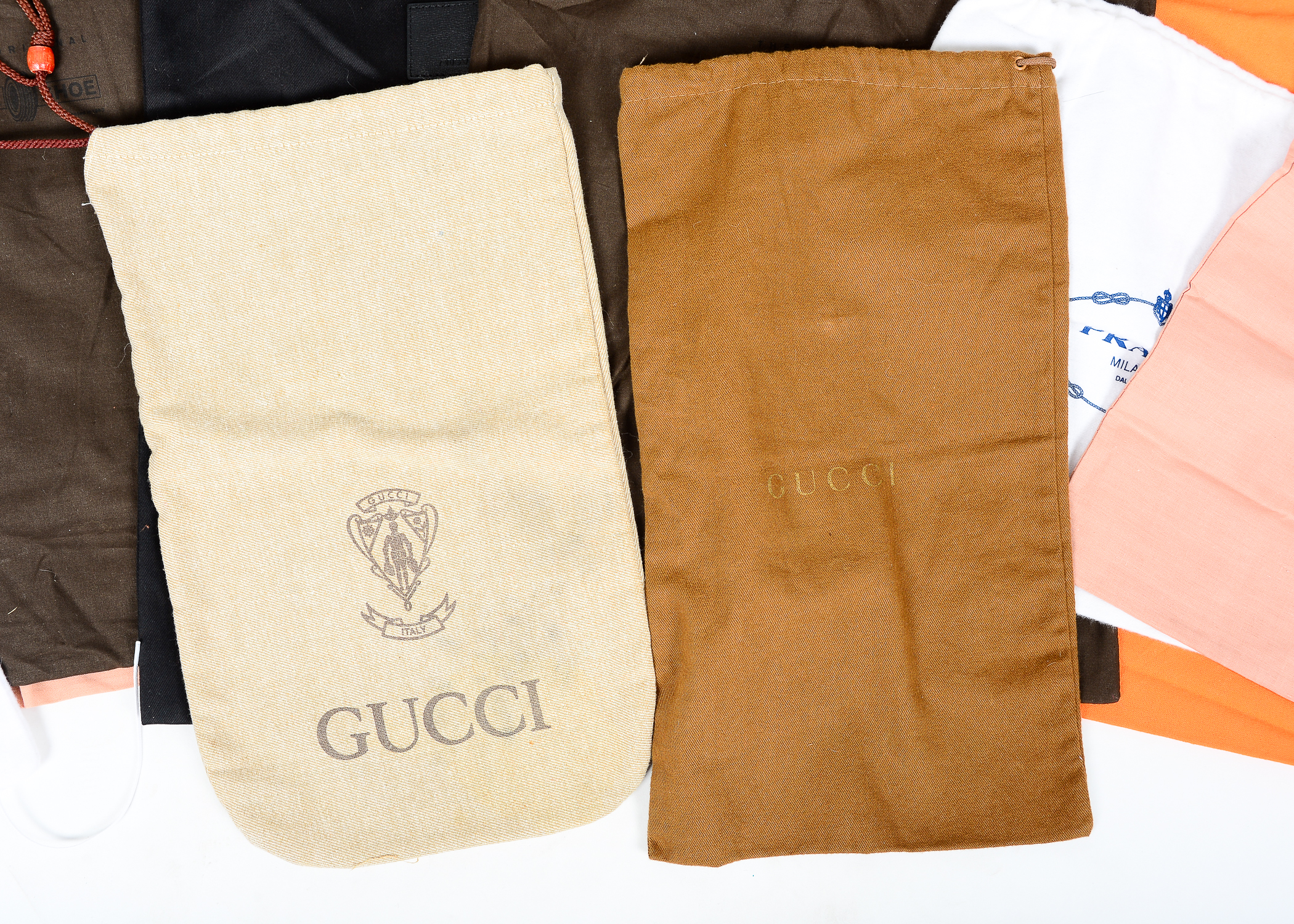 Collection of Dust Bags Featuring Prada, Chanel, Gucci, and More