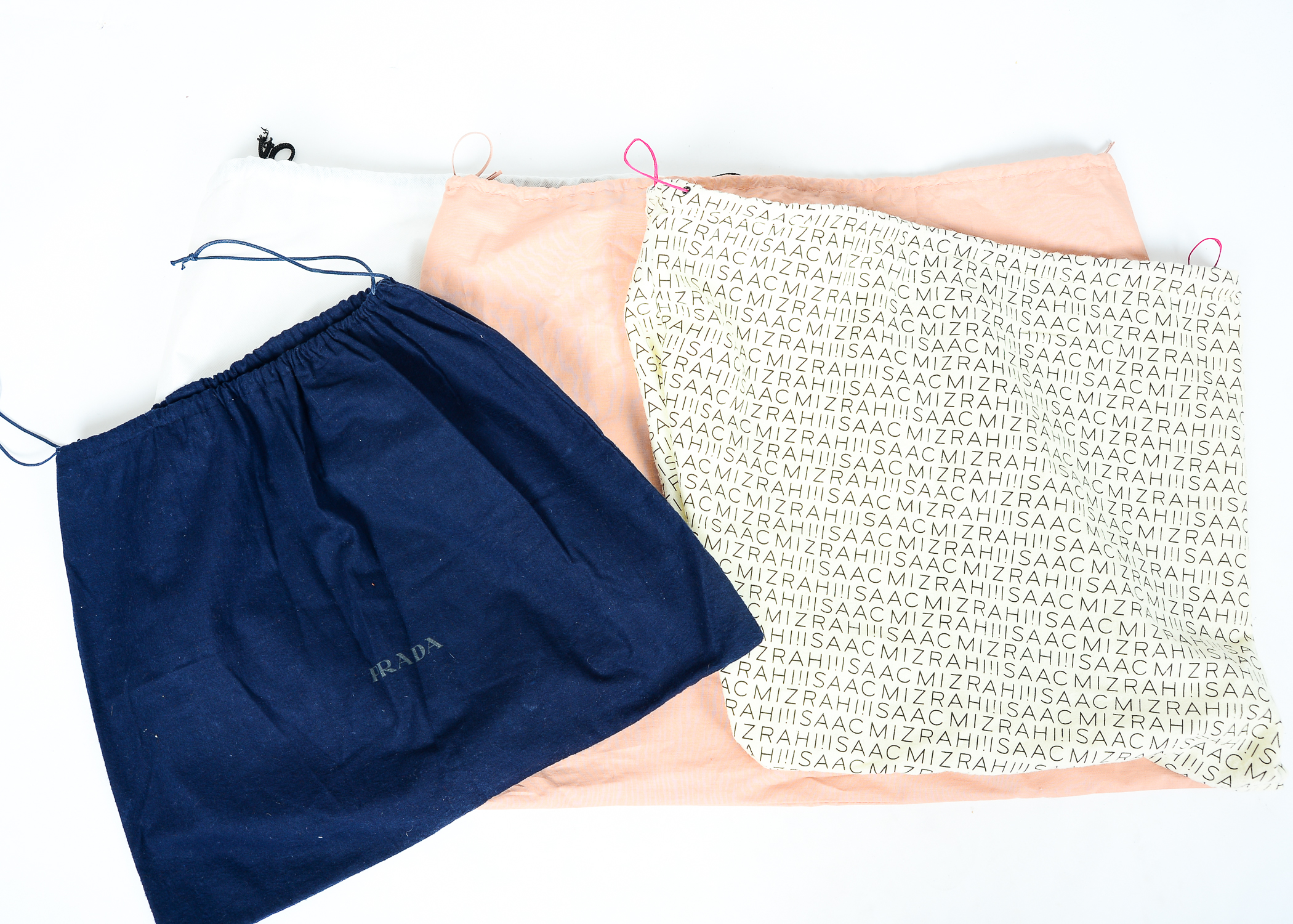 Collection of Dust Bags Featuring Prada, Chanel, Gucci, and More