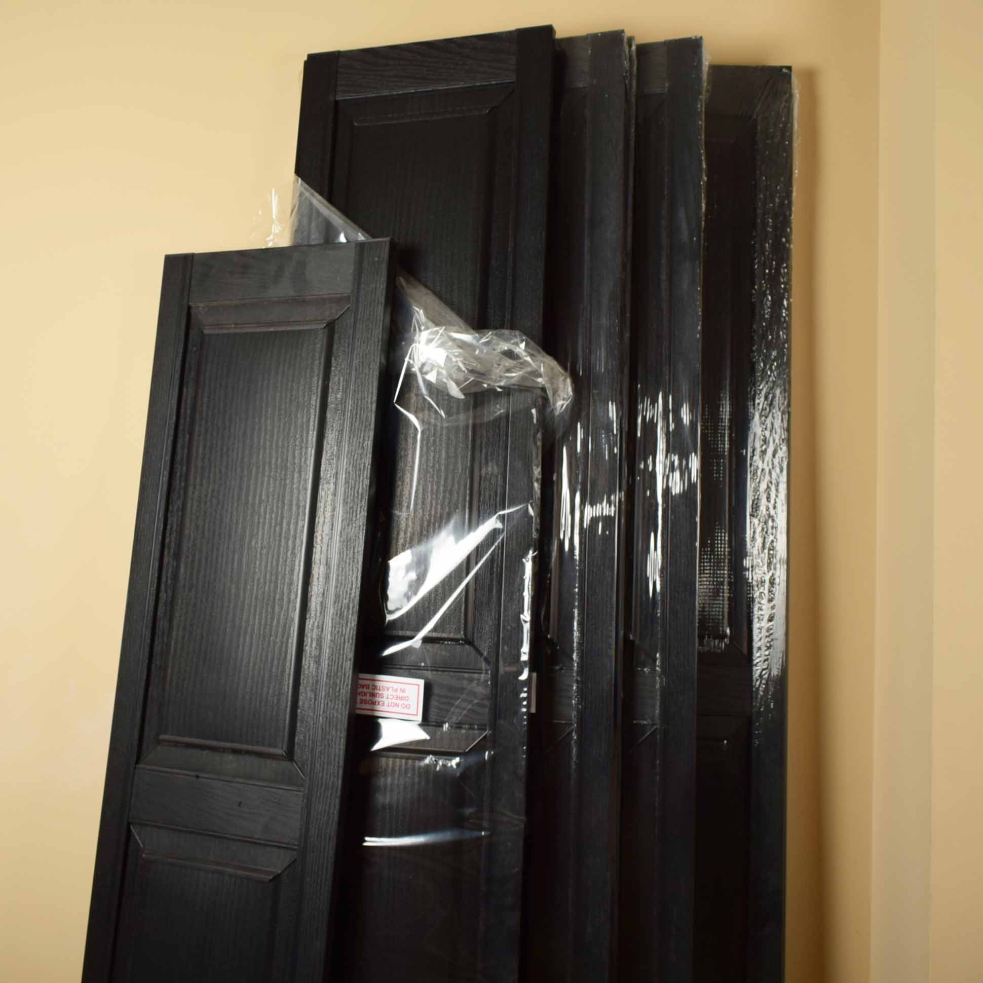 Five Pairs of Black Vinyl Raised Panel Exterior Shutters