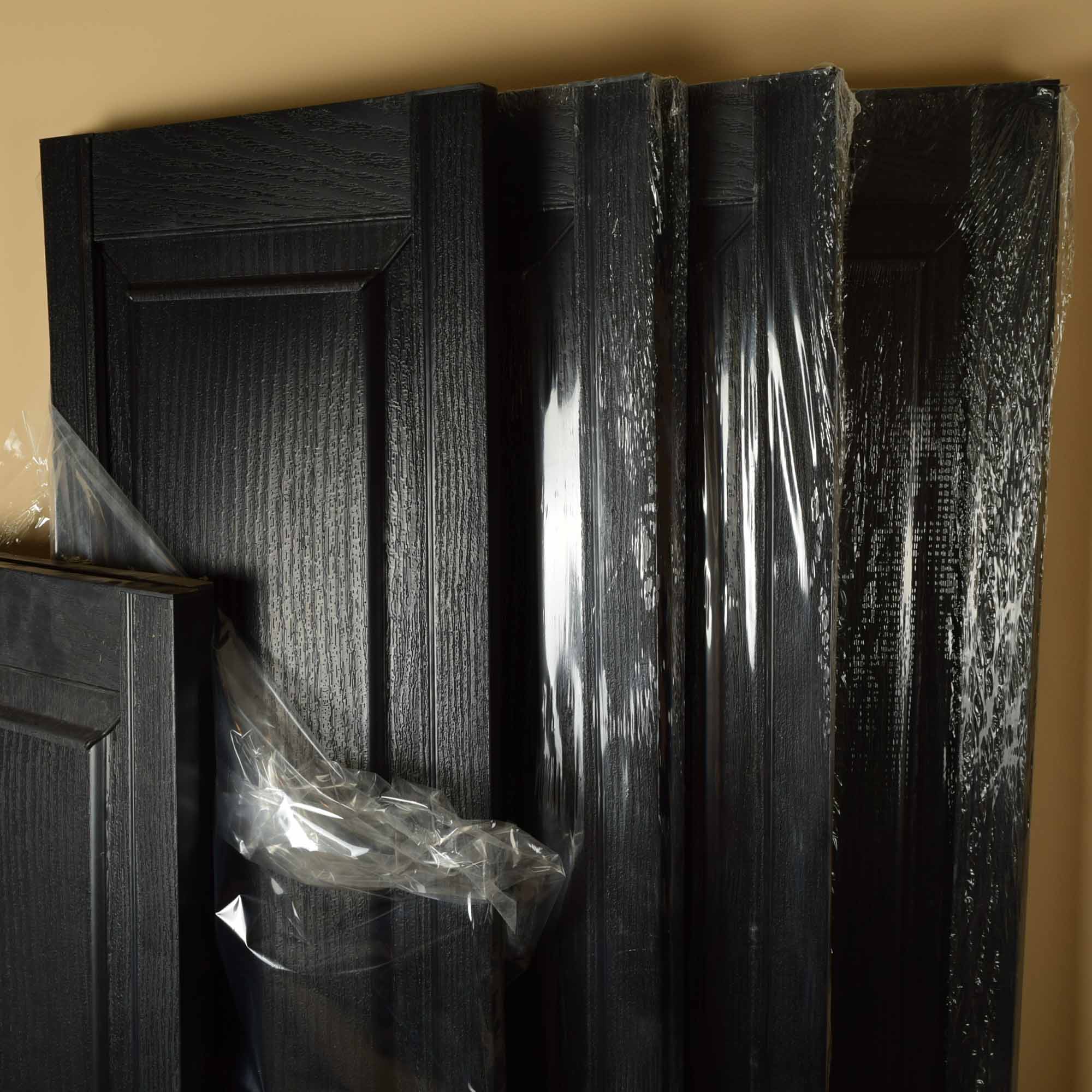 Five Pairs of Black Vinyl Raised Panel Exterior Shutters