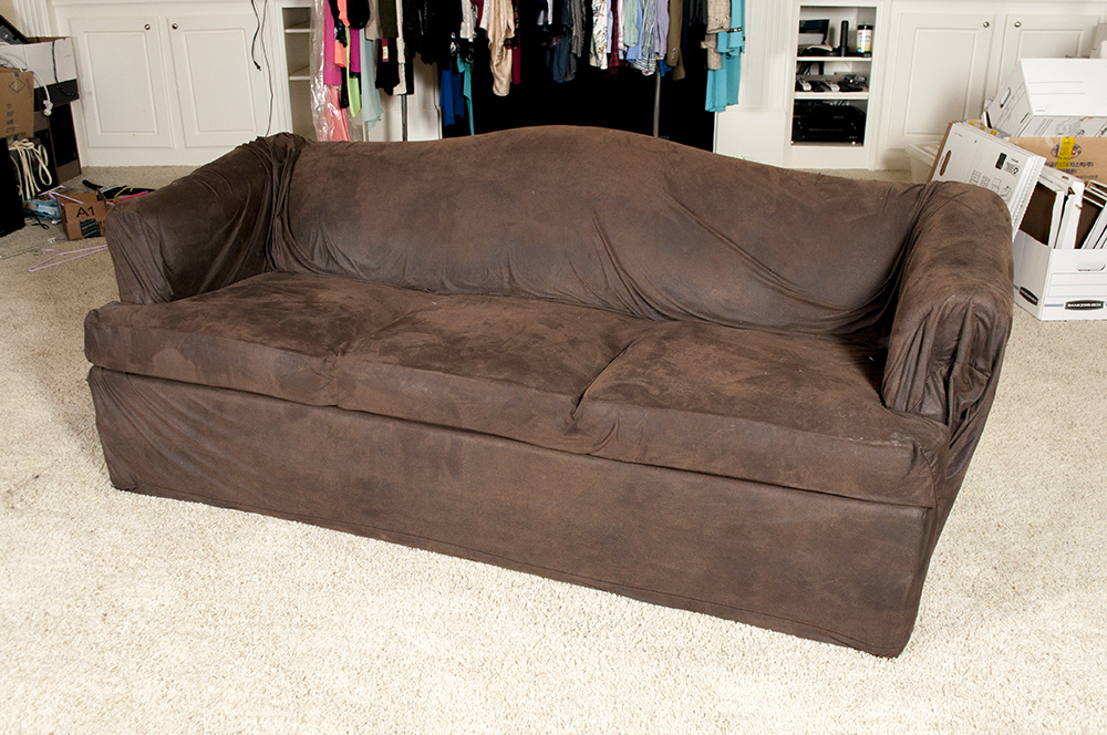 Sleeper Sofa with Microsuede Slipcover and Matching Cowhide Pillows