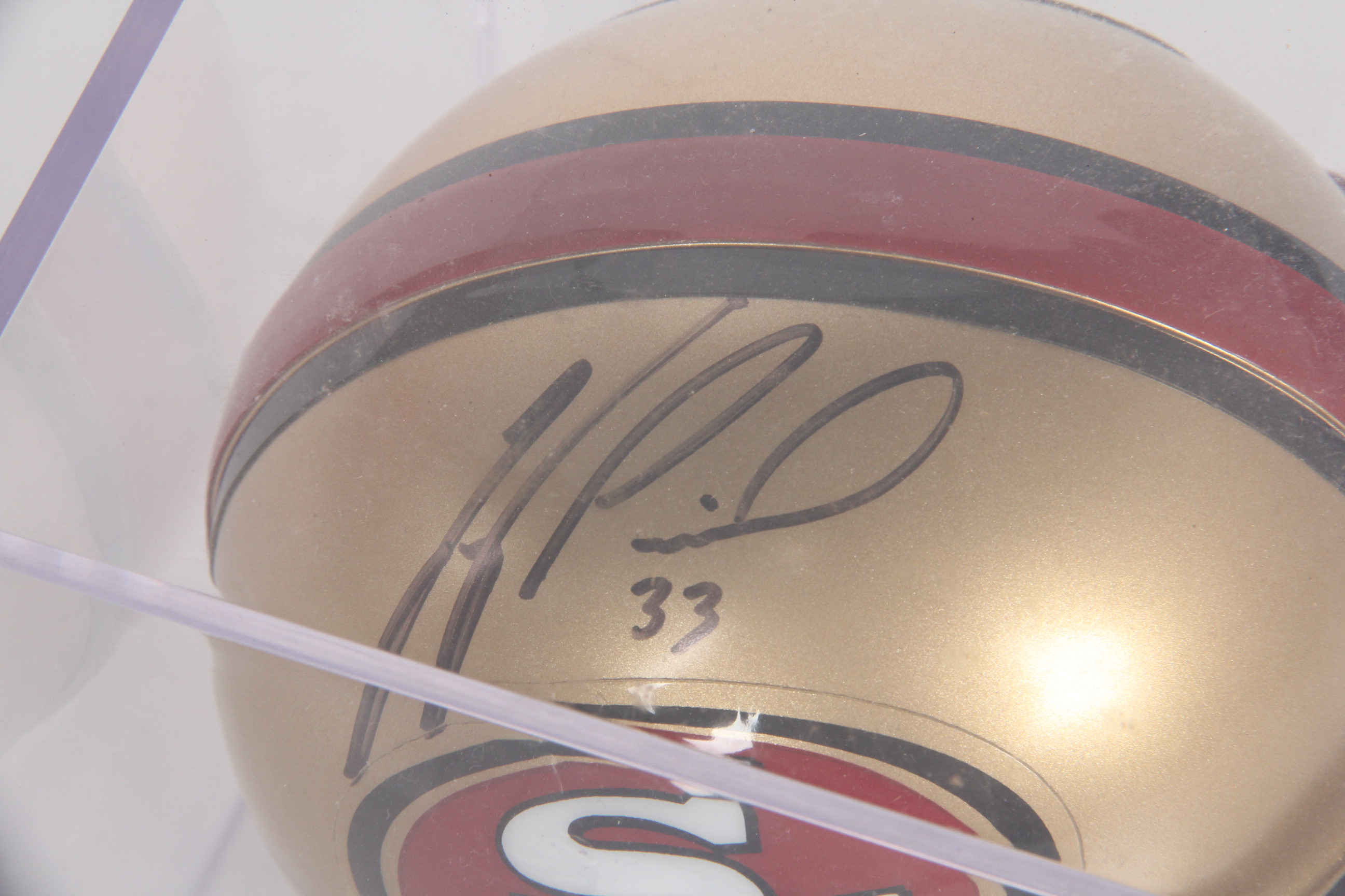 Pair of Signed Miniature Football Helmets Featuring Brent Jones
