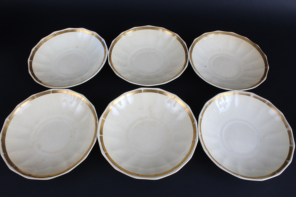 Two Sets of Porcelain Saucers