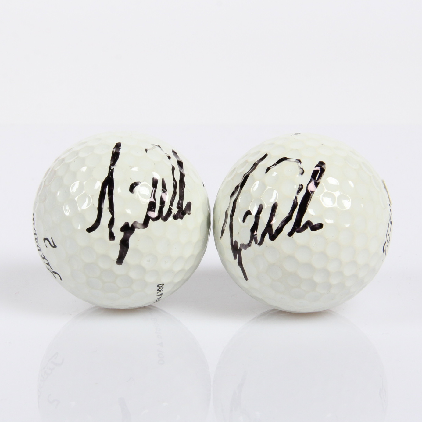 Pair of Tiger Woods Signed Golf Balls