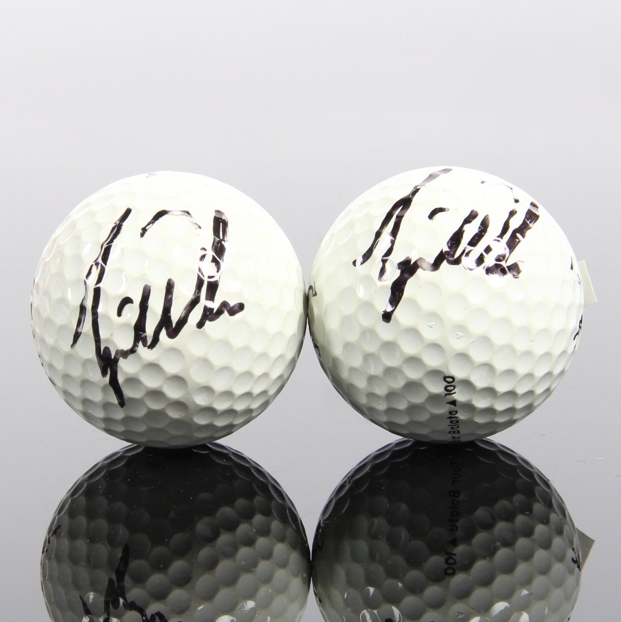 Pair of Tiger Woods Signed Golf Balls