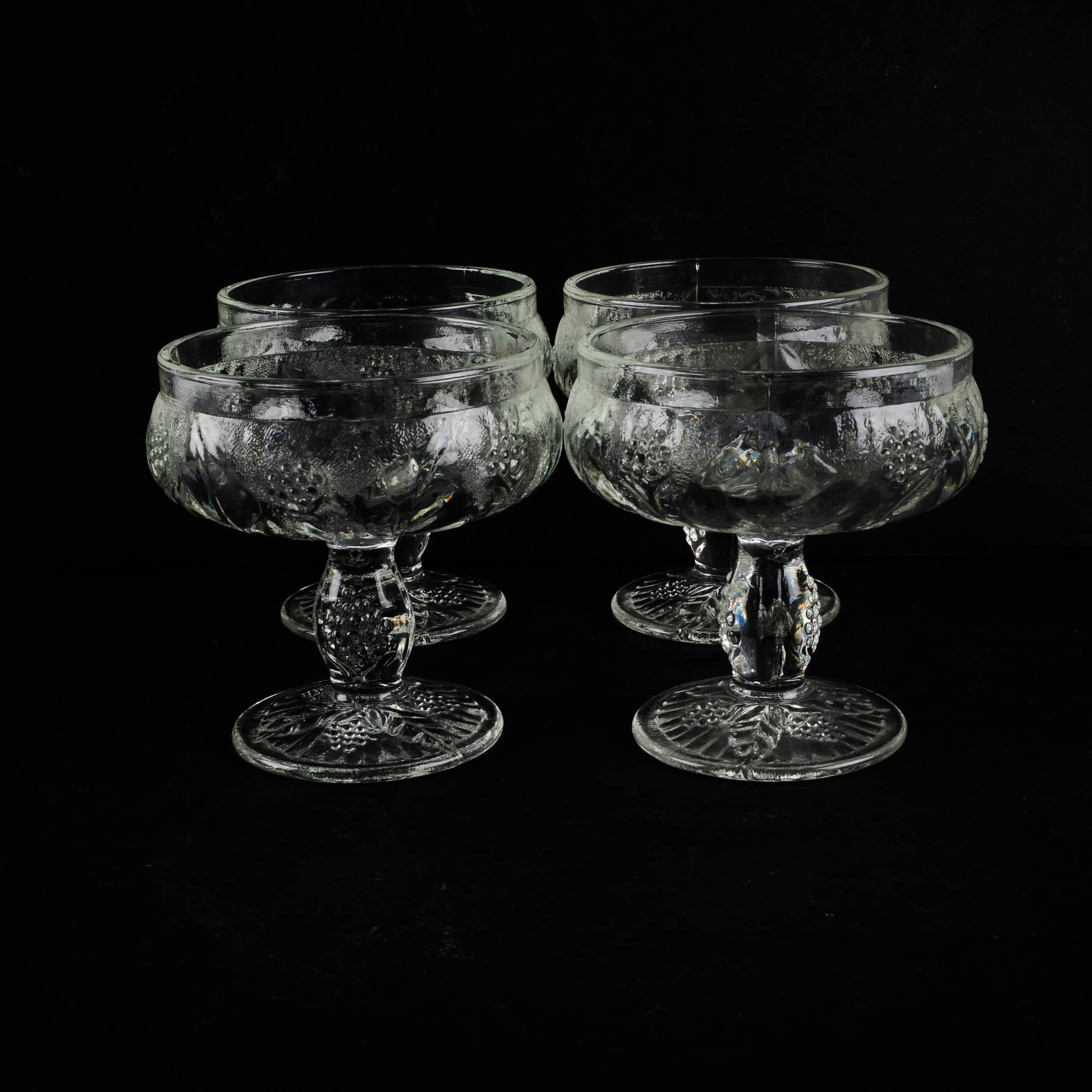 Four Vintage Pressed Glass Dessert Dishes