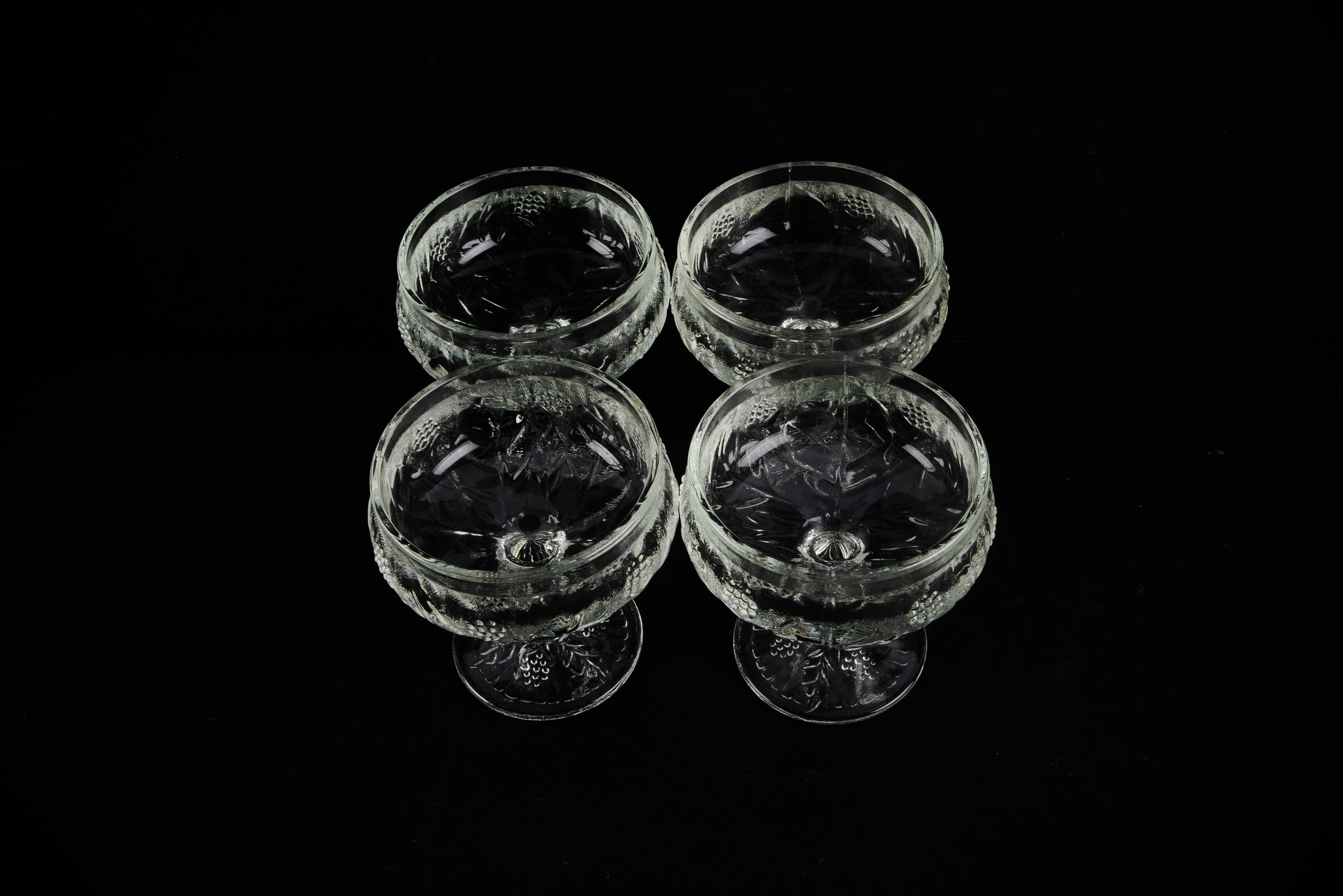 Four Vintage Pressed Glass Dessert Dishes