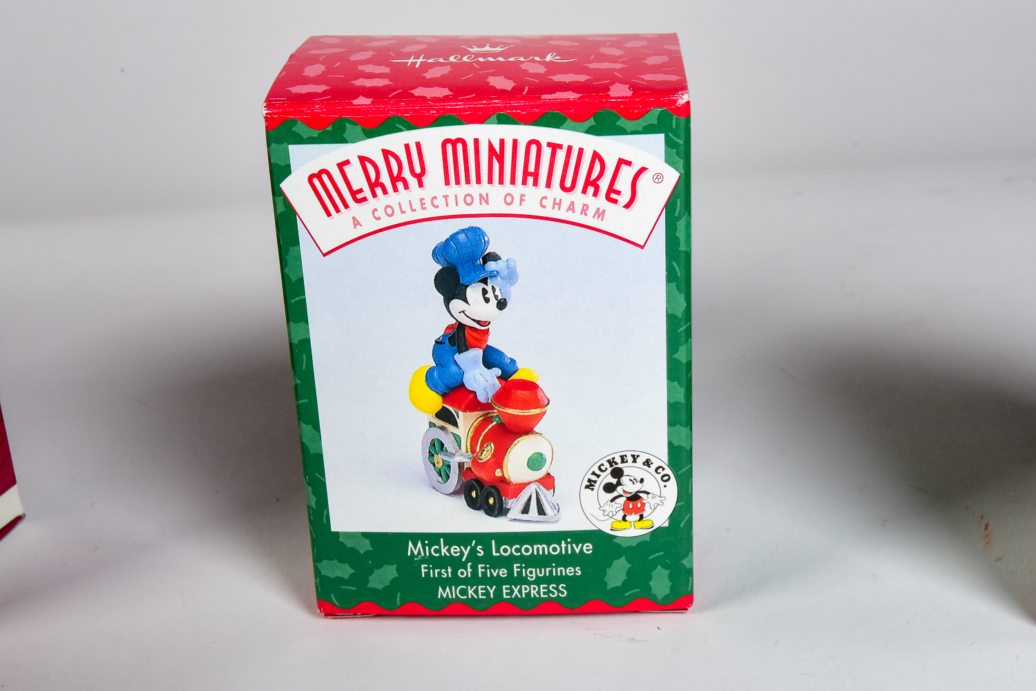 Group of Disney and Seuss Hallmark Ornaments