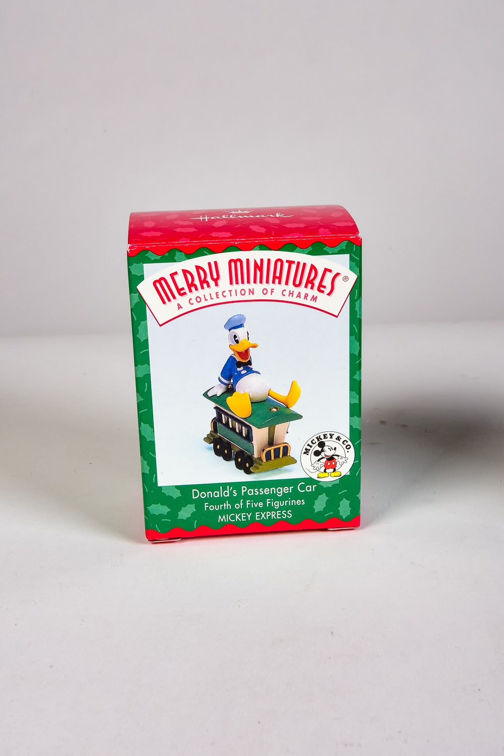 Group of Disney and Seuss Hallmark Ornaments