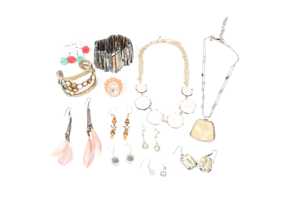 Collection of Costume Jewelry Including a Carved Shell Stretch Bracelet