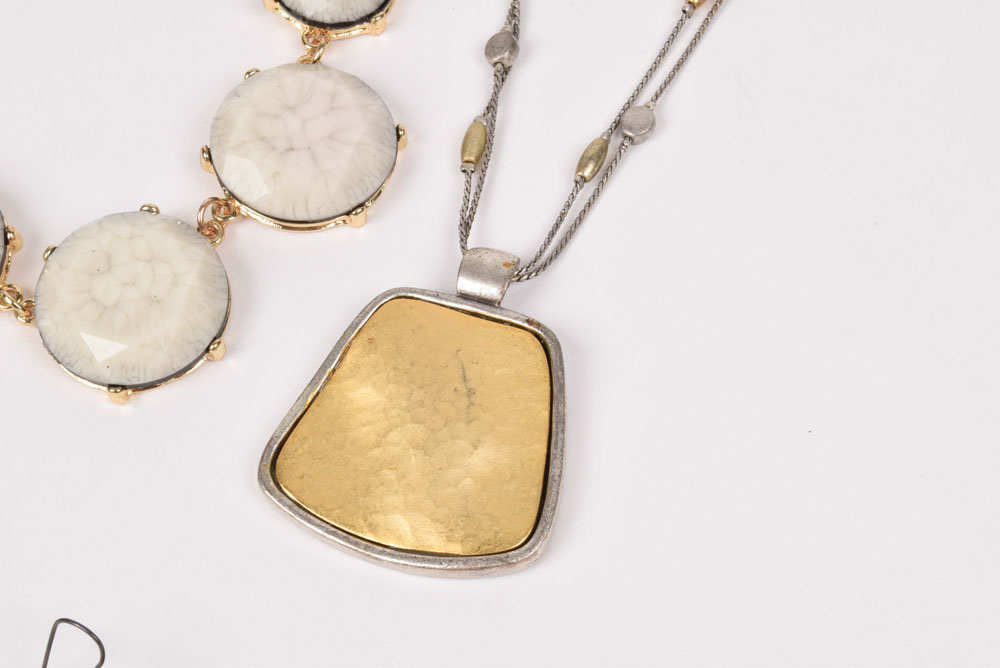 Collection of Costume Jewelry Including a Carved Shell Stretch Bracelet