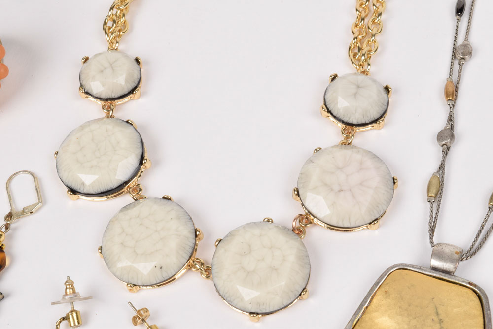 Collection of Costume Jewelry Including a Carved Shell Stretch Bracelet