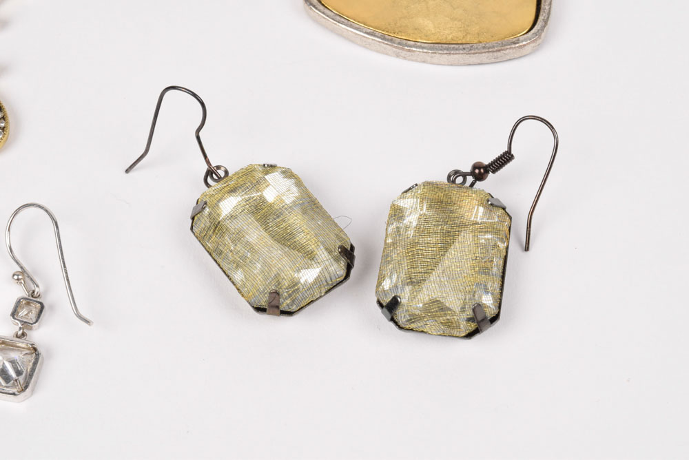 Collection of Costume Jewelry Including a Carved Shell Stretch Bracelet