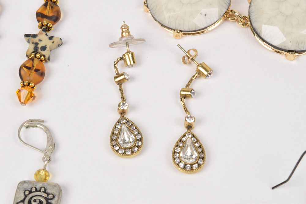 Collection of Costume Jewelry Including a Carved Shell Stretch Bracelet