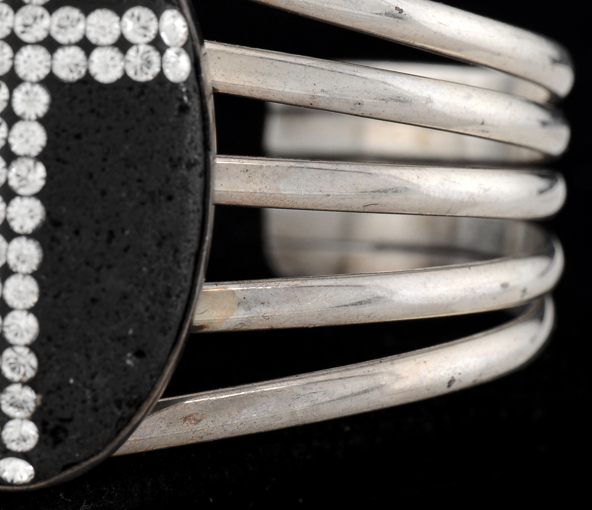 Sterling Silver Openwork Slit Cuff with Oval Bezel Set Lava Stone Encrusted with Crystal Rhinestones