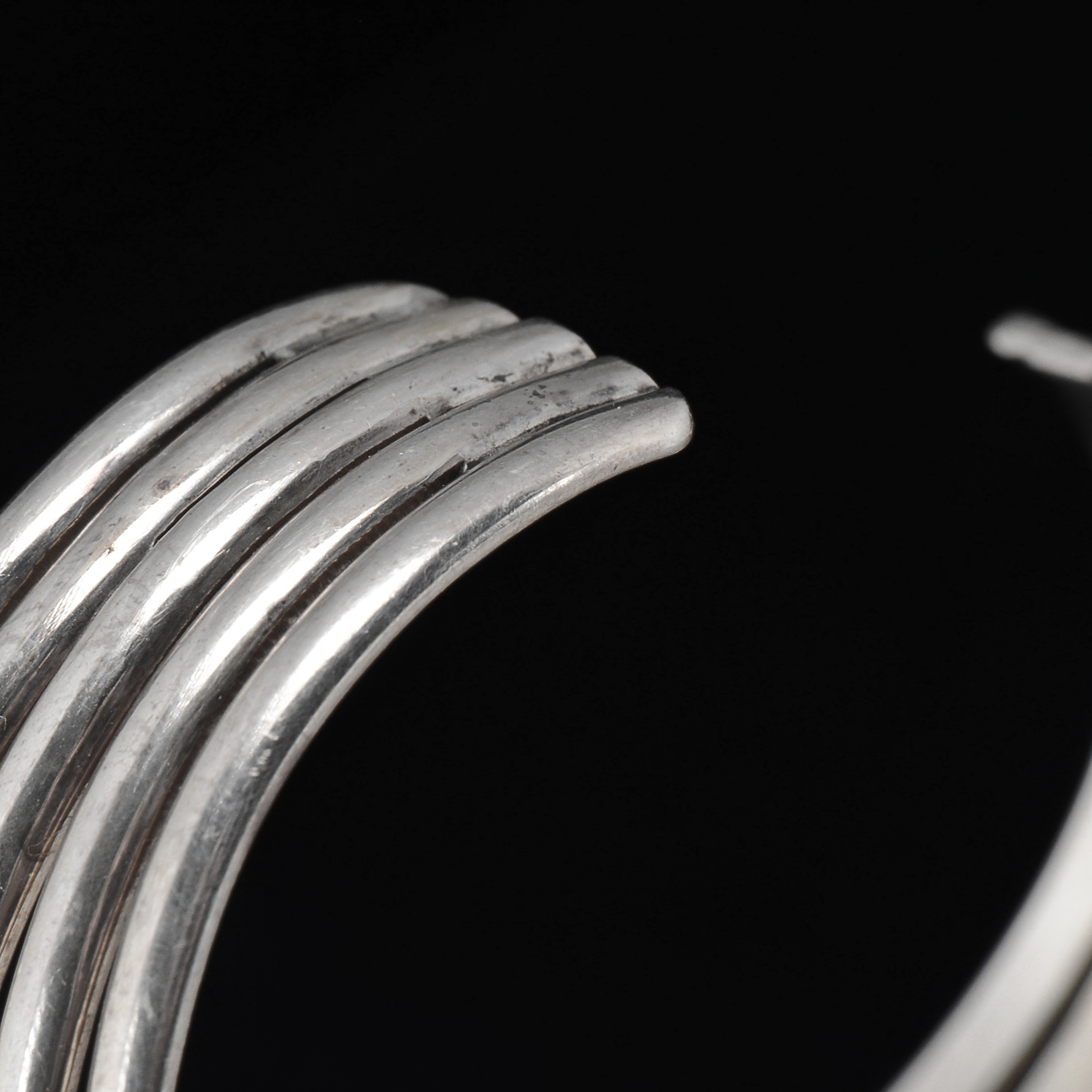 Sterling Silver Openwork Slit Cuff with Oval Bezel Set Lava Stone Encrusted with Crystal Rhinestones