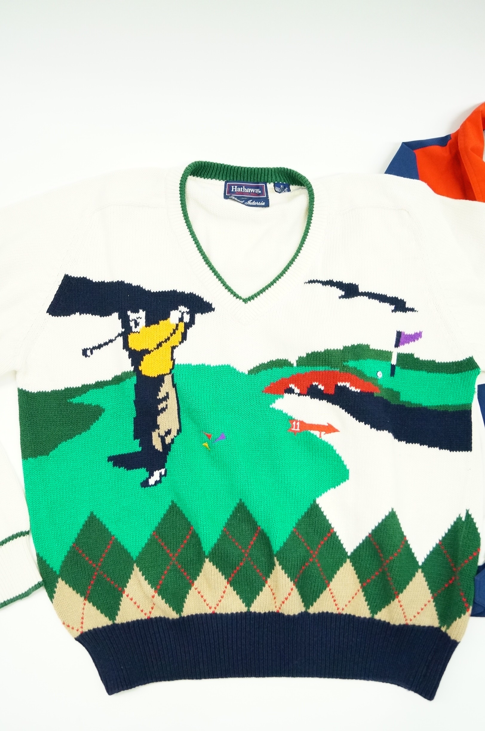 Hand Knit Golf Sweater and Gore-Tex Tourney Jacket