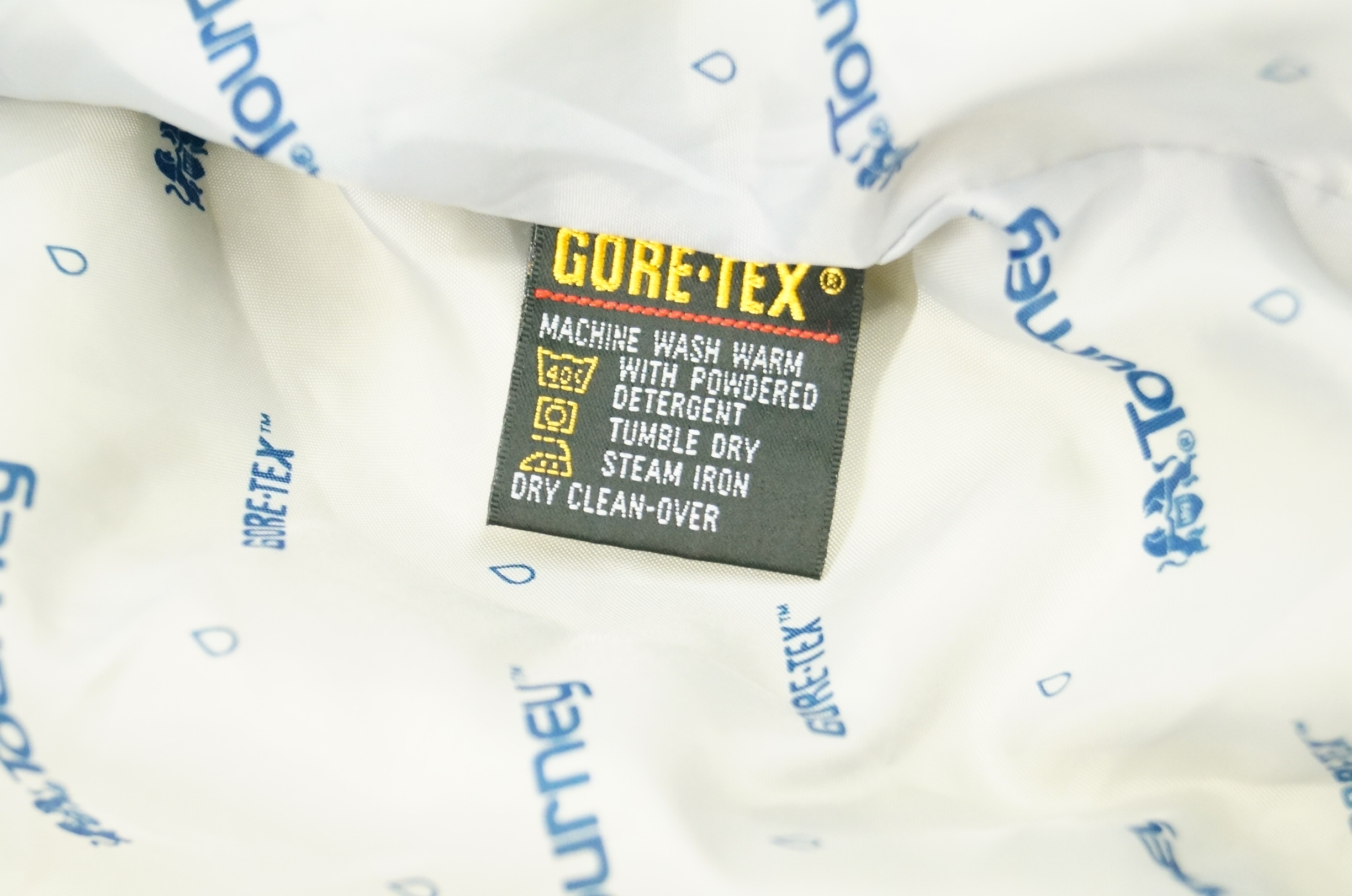 Hand Knit Golf Sweater and Gore-Tex Tourney Jacket