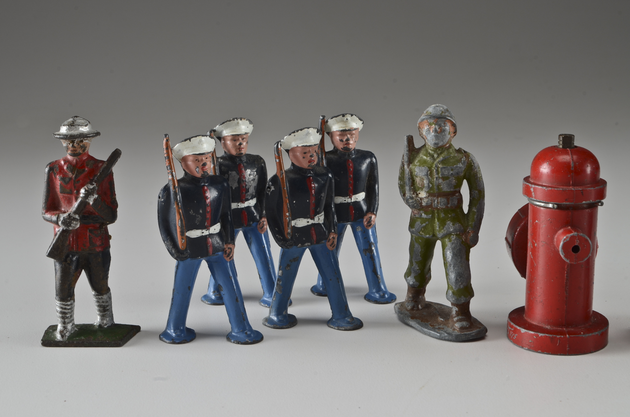 Vintage Cast Metal Toy Soldiers and Die Cast Vehicles