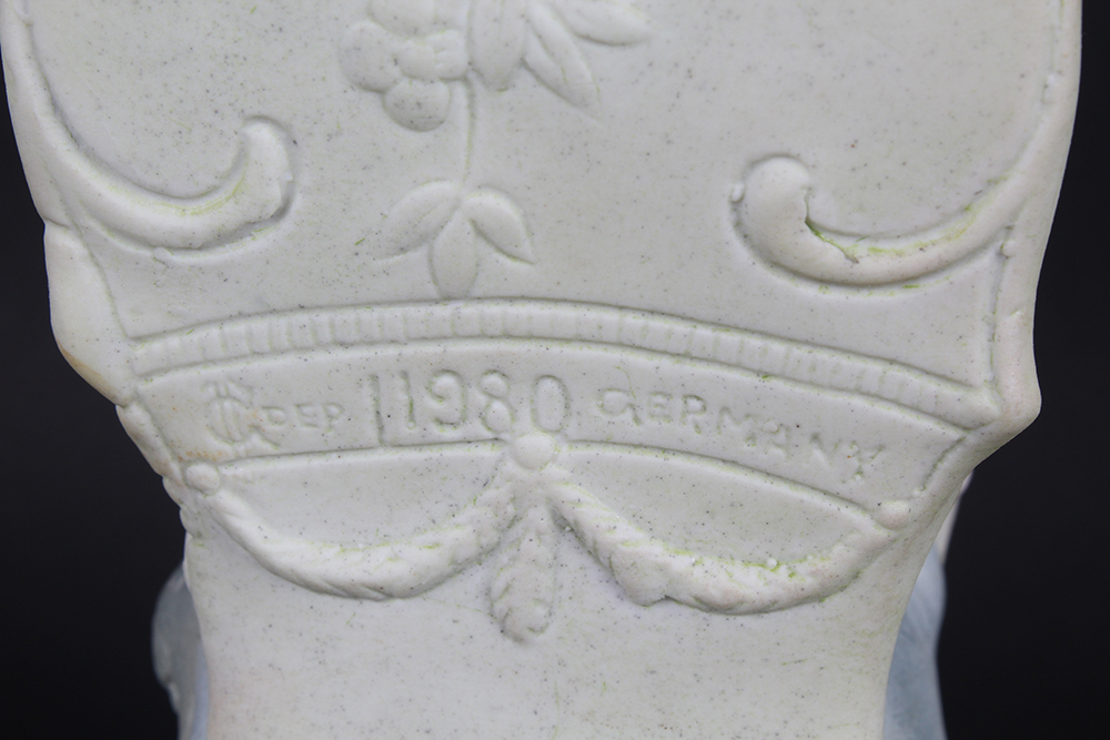 C. 1880 Unger, Schneider & Co. Porcelain Seated Couple Figurines