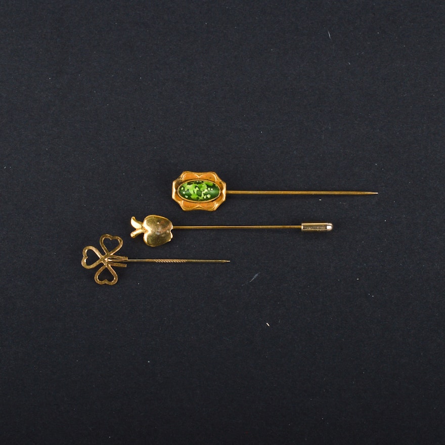 Three Gold-Tone Straight Pins