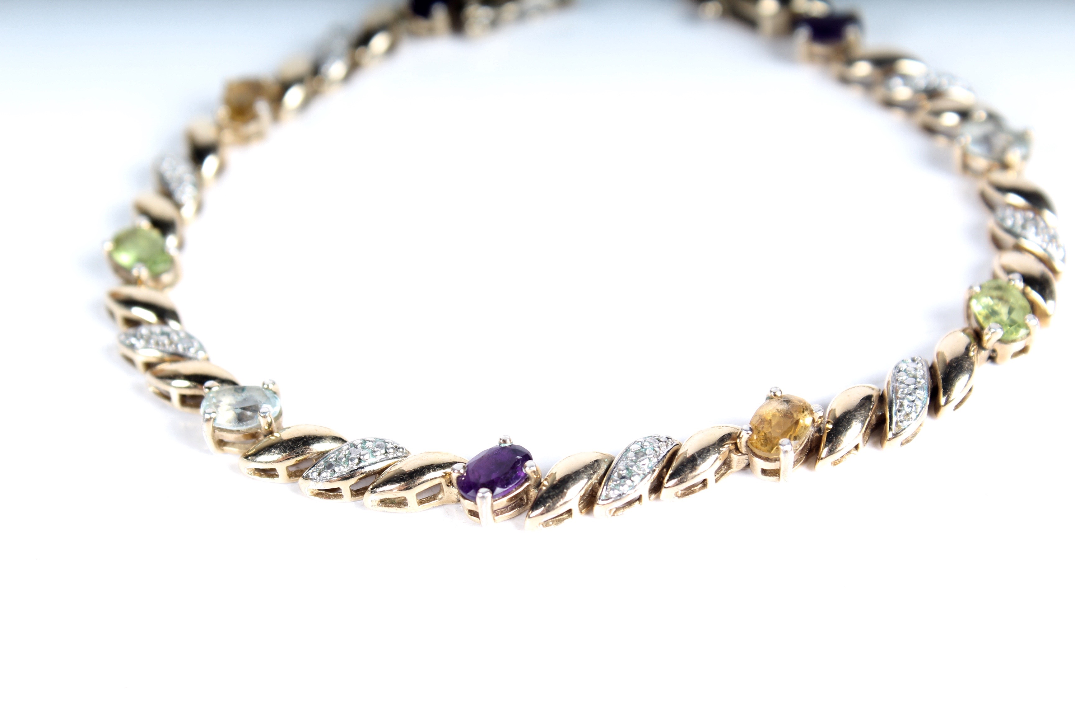 A Multi-Gemstone Tennis Bracelet