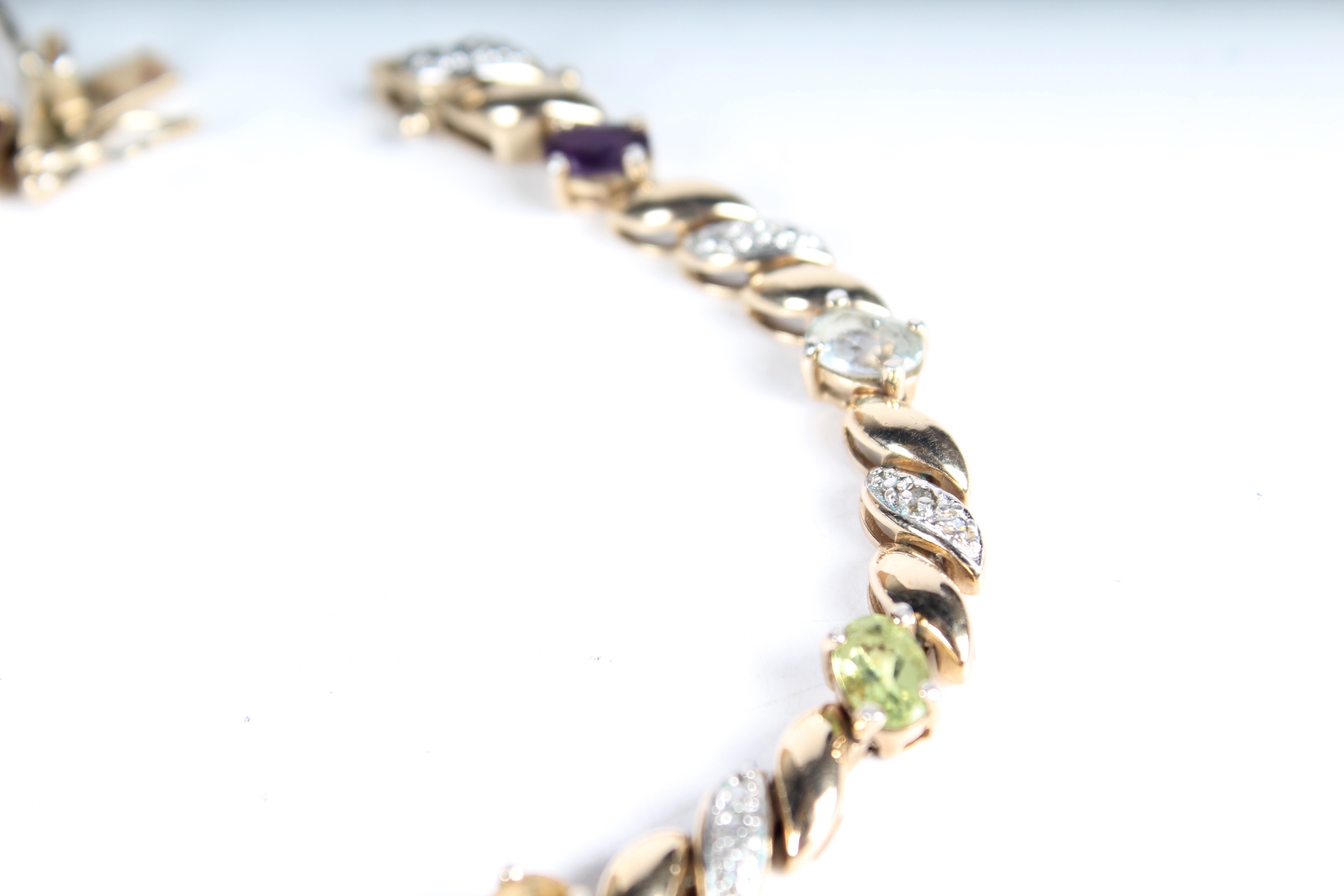 A Multi-Gemstone Tennis Bracelet