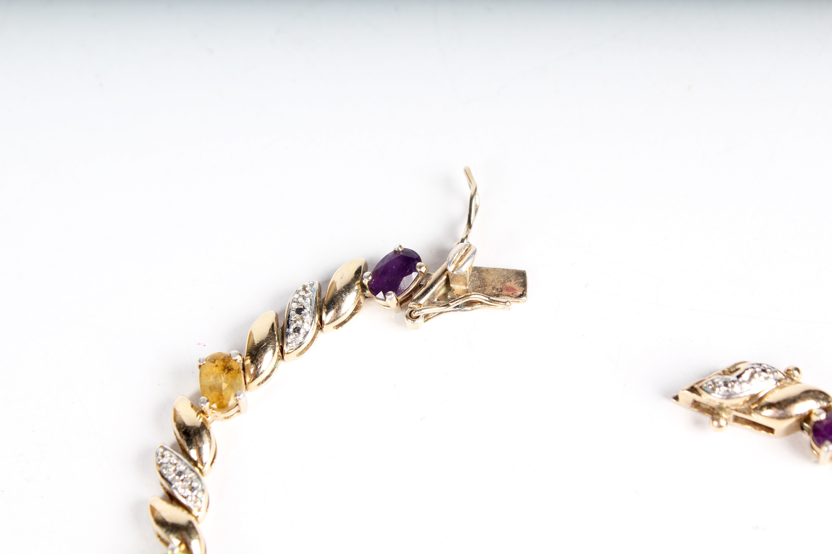 A Multi-Gemstone Tennis Bracelet